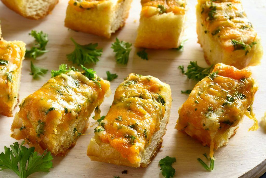 Cheese and garlic bread with greens